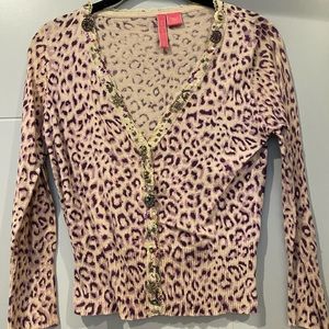 Purple leopard cotton cardigan with jeweled buttons and sequin trim.